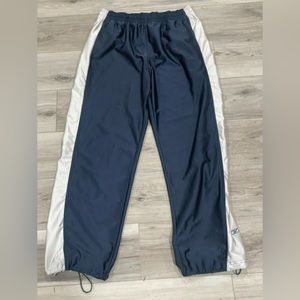 Vintage Reebok silk track pants, pull button at ankle, size large.